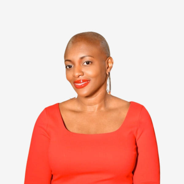 Picture of Founder Nikki on a laptop screen.  She is wearing a red top, with red lipstick, smiling.